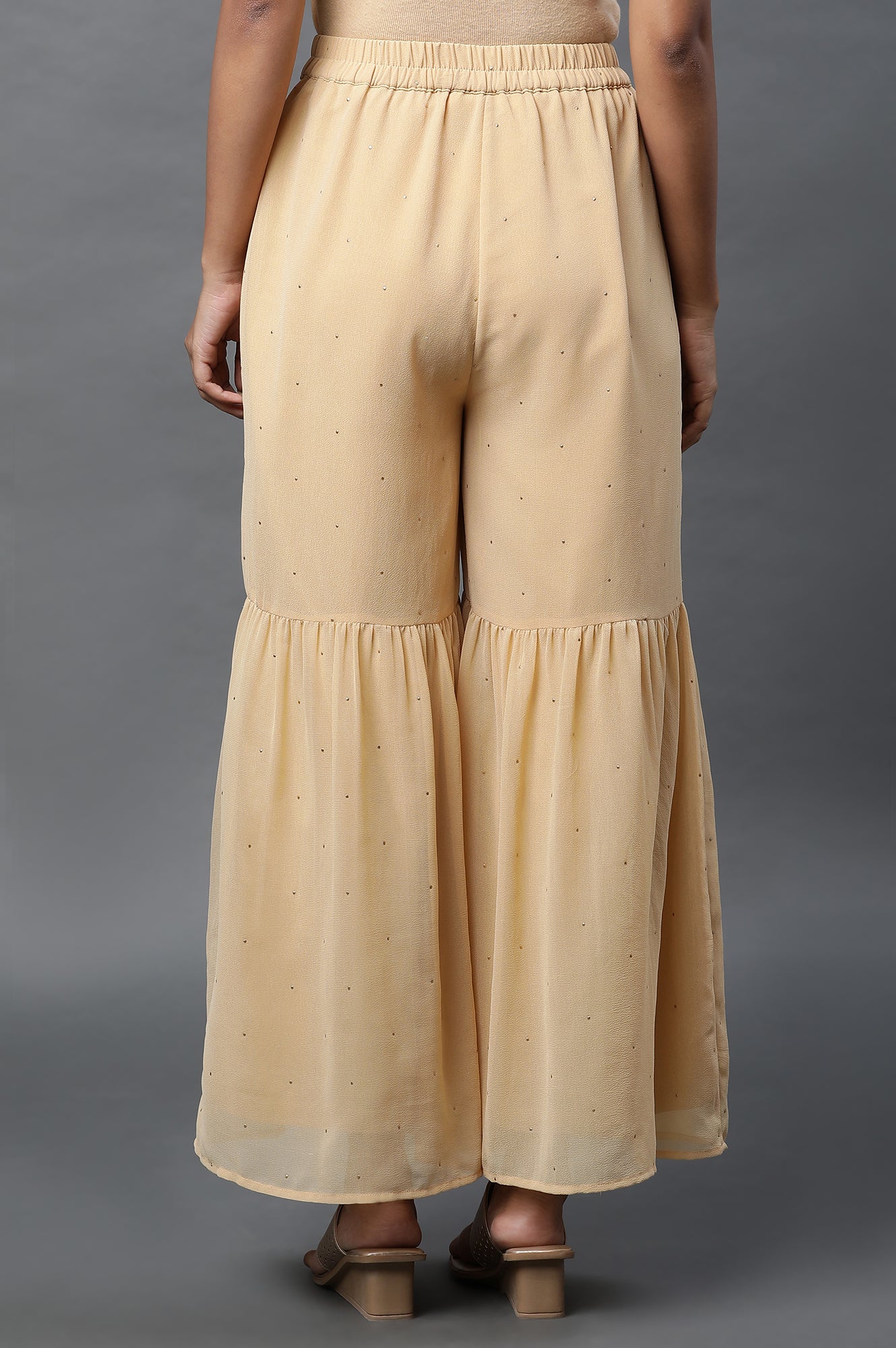 Gold Polka Dots Printed Flared Woven Palazzo With Elasticated Waist - Image 3