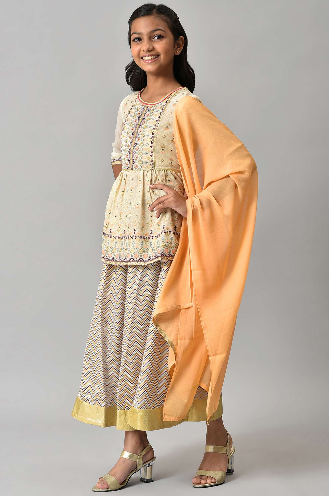 Girls Beige Floral Peplum Top With Skirt And Orange Dupatta - Image 3