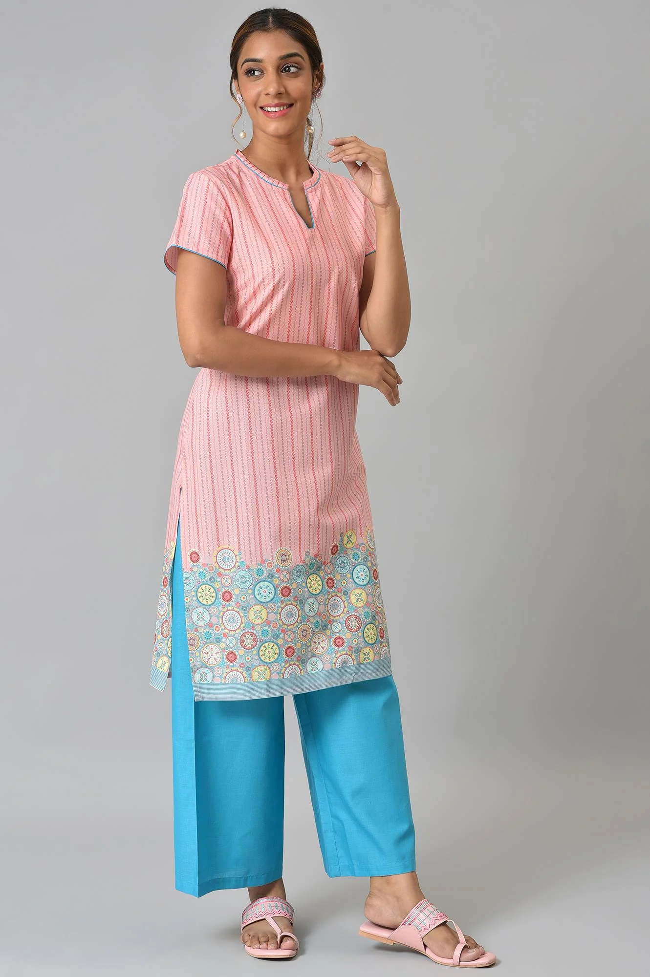 Peach Printed kurta With Blue Palazzos - Image 4