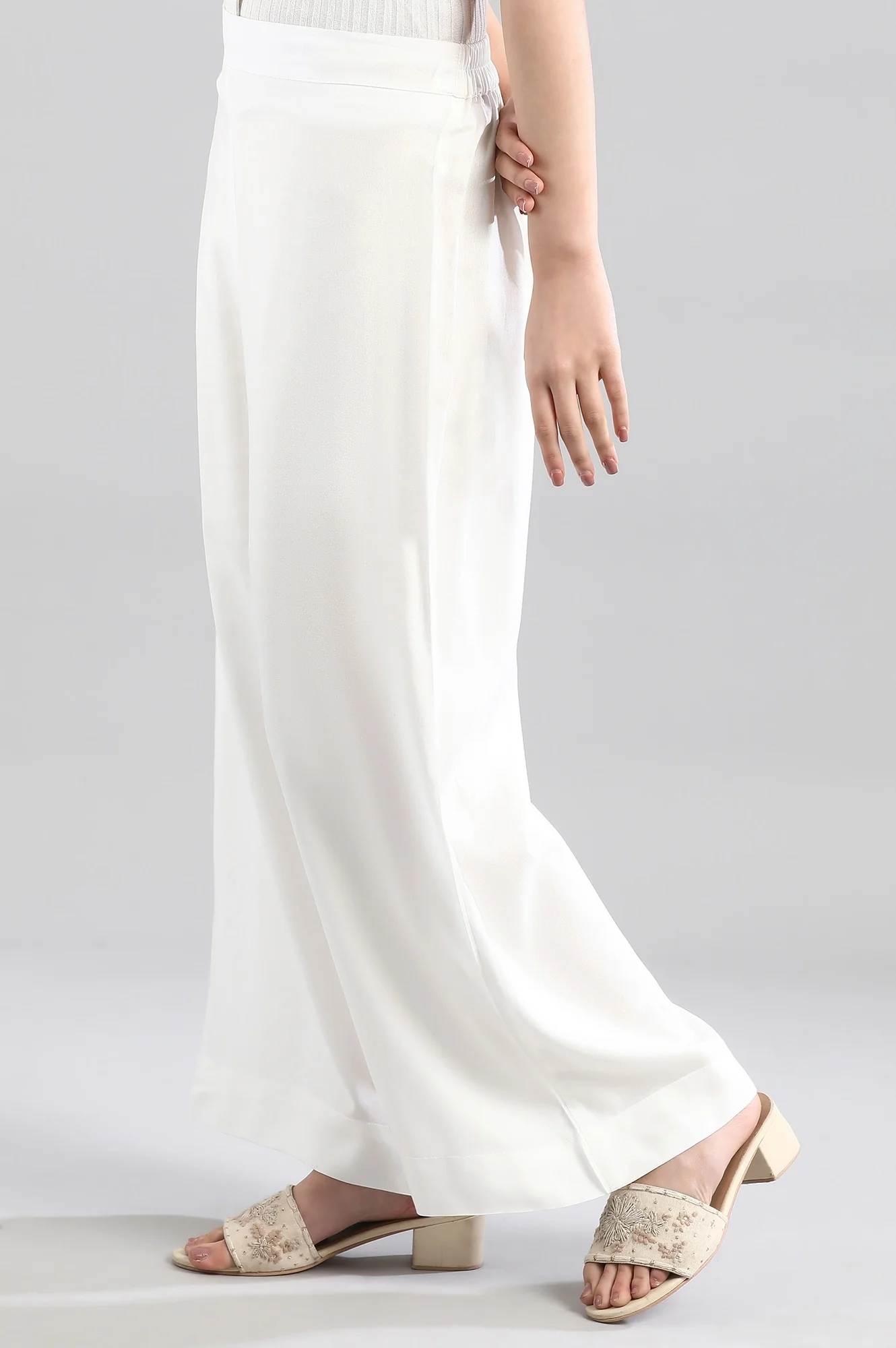 White Solid Flared Woven Palazzo With Elasticated Waistband - Image 3