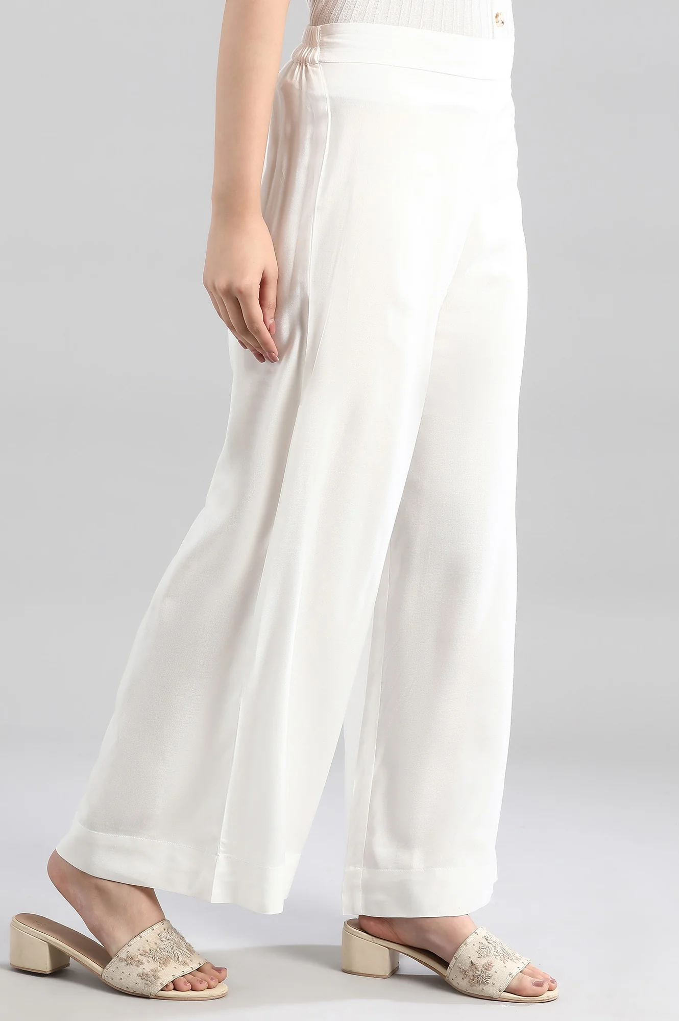 White Solid Flared Woven Palazzo With Elasticated Waistband - Image 4